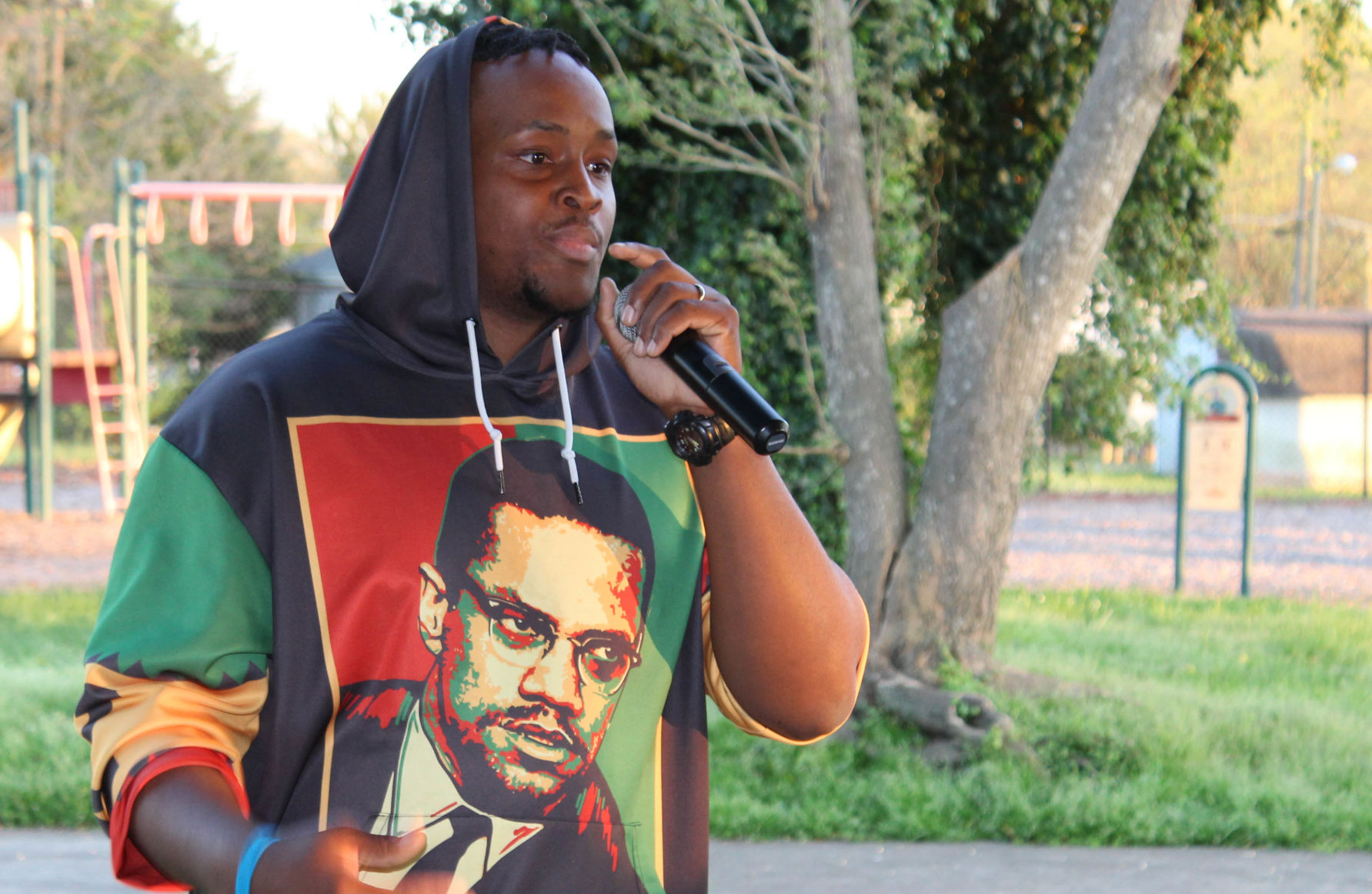 Candlelight vigil inspired by slain rapper remembers local homicide victims